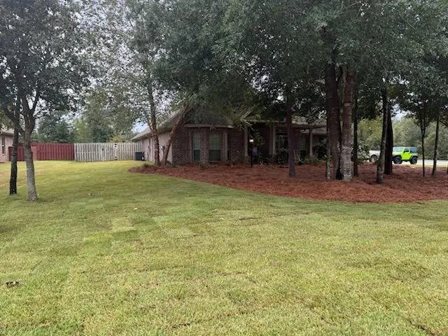 Reliable yard maintenance in Panama City, FL by Land’s Lawn and Pest Service