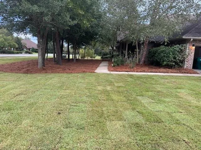 Professional lawn mowing service with custom design in Panama City, FL by Land’s Lawn and Pest Service