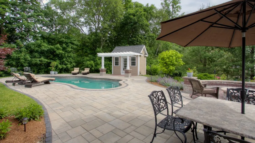 Professional outdoor landscaping for year-round maintenance in Wrentham, MA by Landscape America