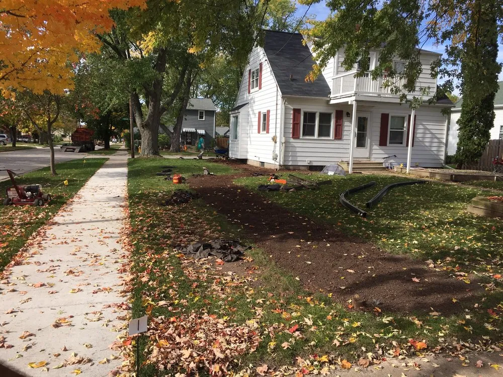 Professional landscaping services for year-round maintenance across De Pere, WI - Landscape Associates