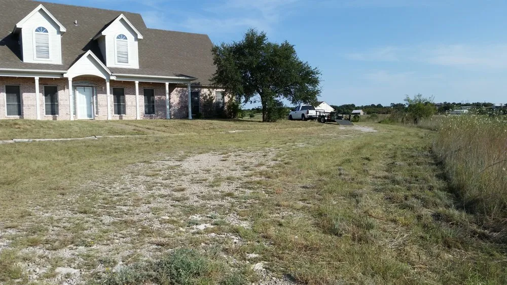 Affordable yard cleanup service for year-round maintenance in Weatherford, TX by Landscape Bros J&I