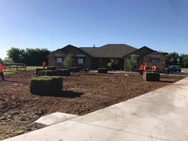 Professional yard cleanup service with custom design in New Braunfels, TX by Landscape Commander