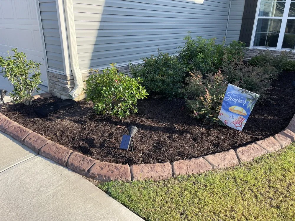 Professional yard maintenance for residential properties in Grovetown, GA by Landscape Concrete Curbing