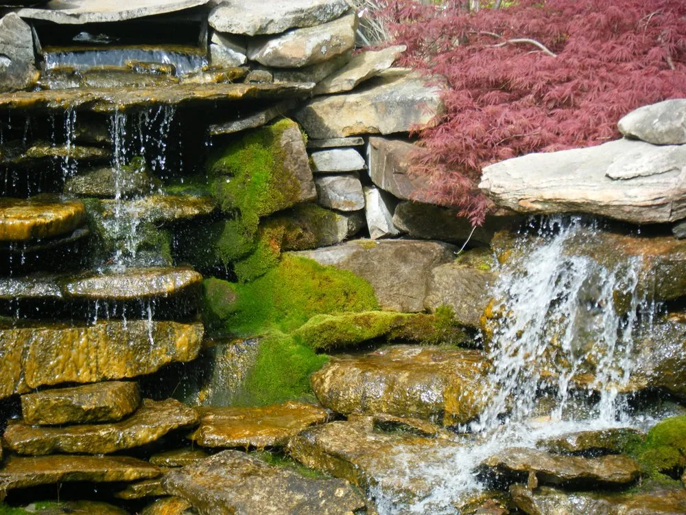 Custom lawn mowing service for outdoor upgrades in Chesterland, OH by Landscape Creations Nursery