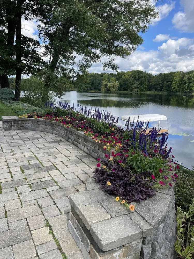 Affordable lawn care service for year-round maintenance in Brighton, MI by Landscape Design & Associates