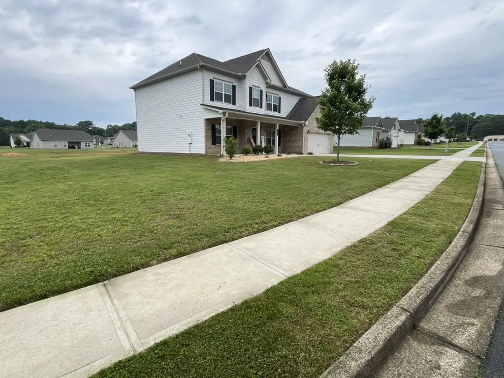 Professional yard maintenance with custom design across Bogart, GA - Landscape Escape