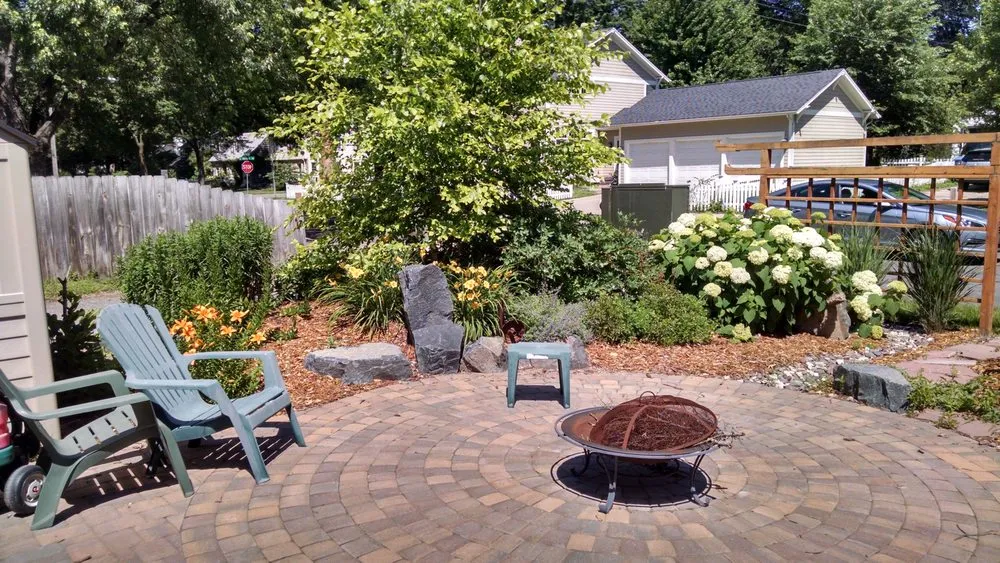 Custom lawn mowing service for year-round maintenance across Northfield, MN - Landscape Gal