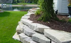 Reliable lawn care service for outdoor upgrades in Caledonia, MI by Landscape Impressions Design & Garden Center