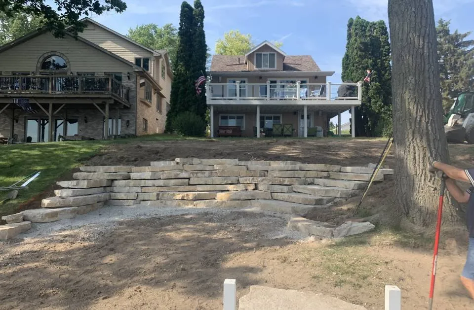 Professional yard cleanup service in Pewaukee, WI by Landscape Livin