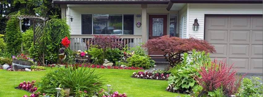 Professional lawn mowing service with custom design across Saint Charles, MO - Landscape Maintenance