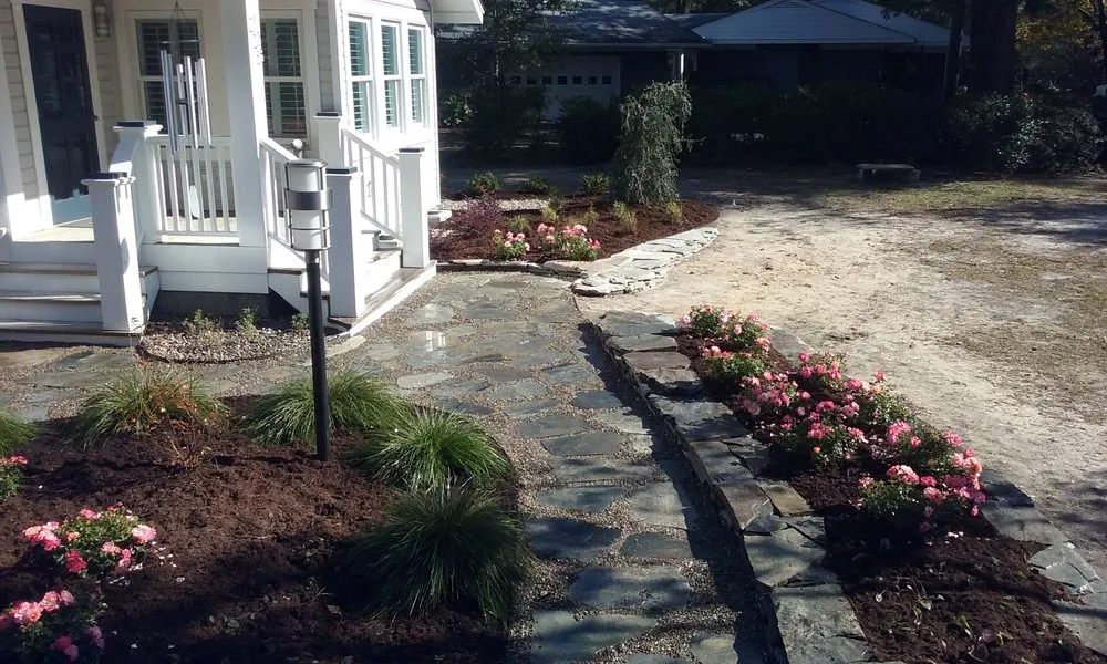 Local lawn mowing service for year-round maintenance in Wilmington, NC by Landscape Resource Group