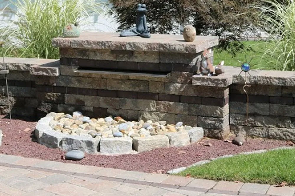 Affordable lawn care service for year-round maintenance across Cumberland, RI - Landscape Solutions