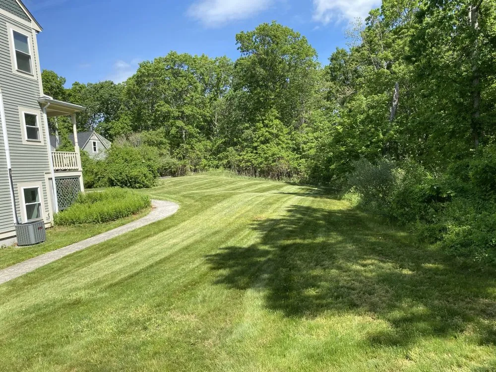 Local lawn mowing service in Milford, MA by Landscape Solutions