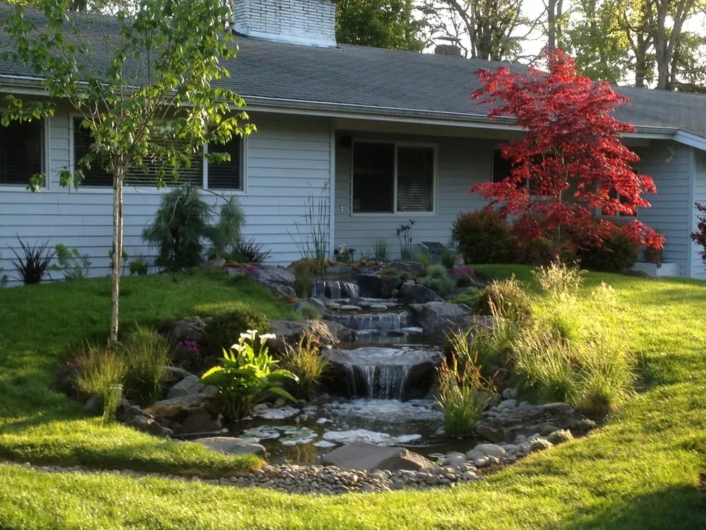 Custom outdoor landscaping with custom design in Portland, OR by Landscape Solutions