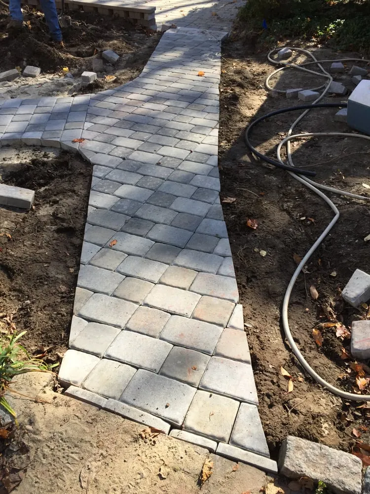 Trusted yard cleanup service for year-round maintenance in Warren, RI by Landscapers Inc