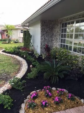 Expert outdoor landscaping for beautiful yards across Coral Springs, FL - Landscapes by Laurie