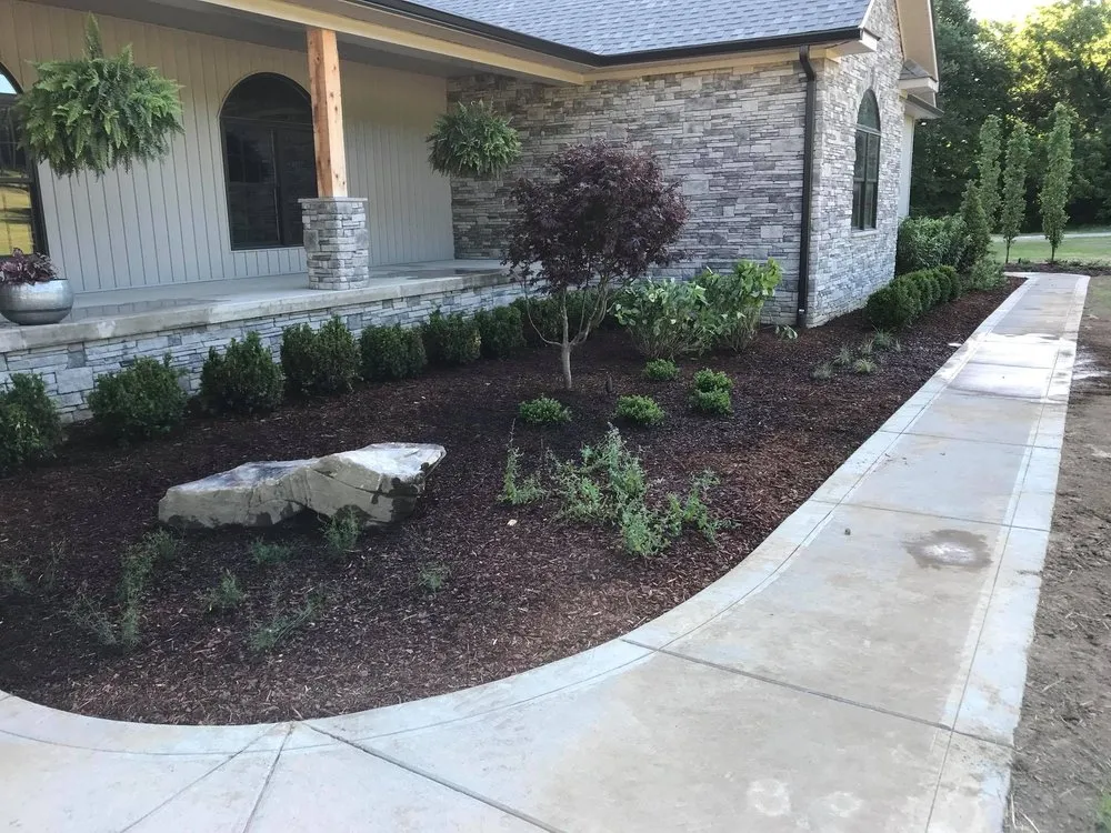 Custom lawn mowing service for beautiful yards in Charlotte, TN by Landscapes By Tidwell