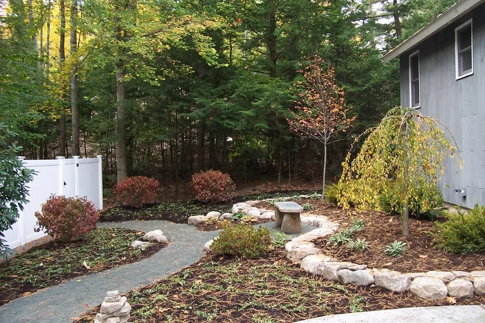 Custom landscape installation for outdoor upgrades across Meredith, NH - Landscapes by Tom