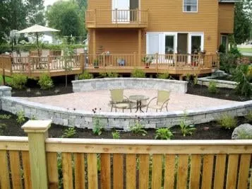 Local lawn mowing service with custom design in Kirkville, NY by Landscapes East