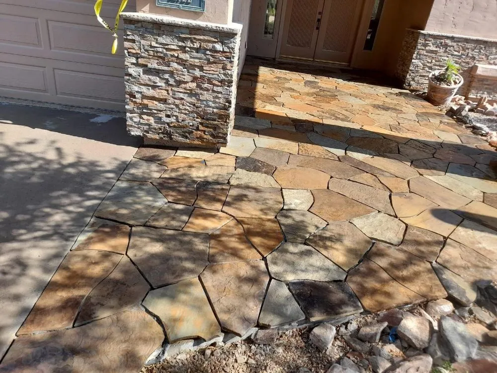 Custom yard cleanup service for residential properties in Phoenix, AZ by Landscaping & Construction