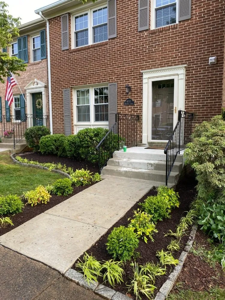 Affordable yard cleanup service for homes in Arlington, VA by Landscaping and Lawn Services