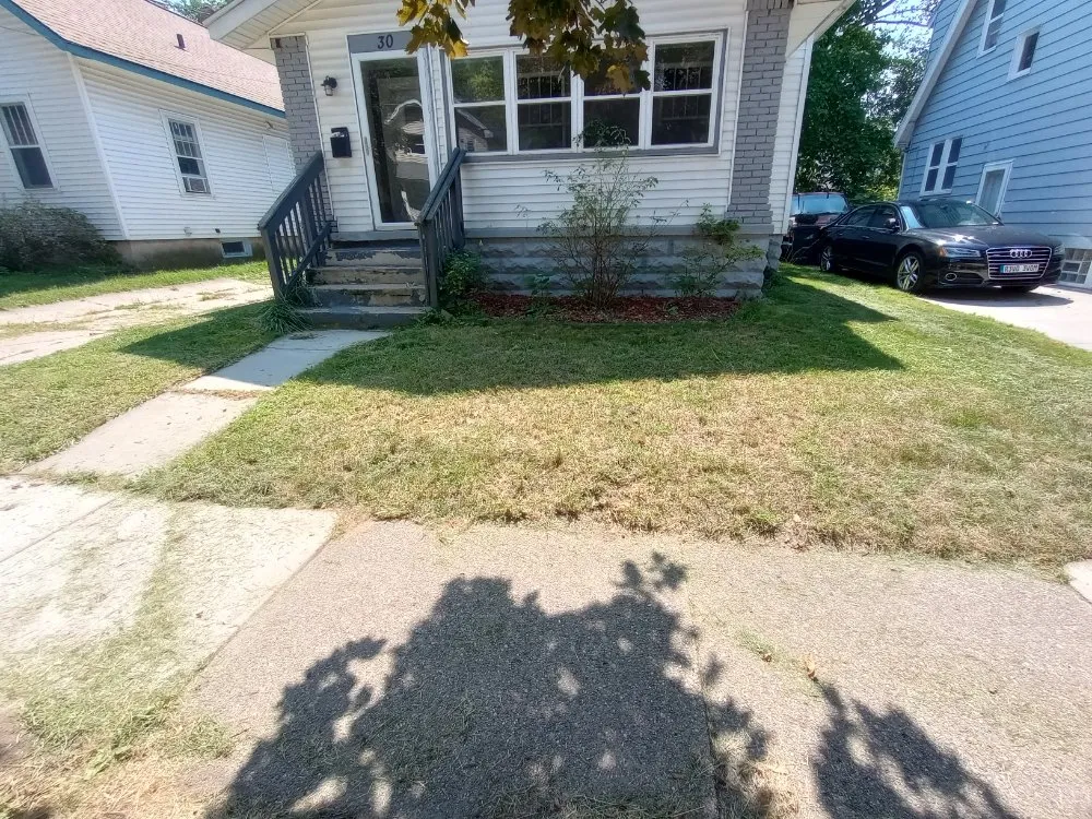 Affordable yard cleanup service with custom design in Grand Rapids, MI by Landscaping Brothers