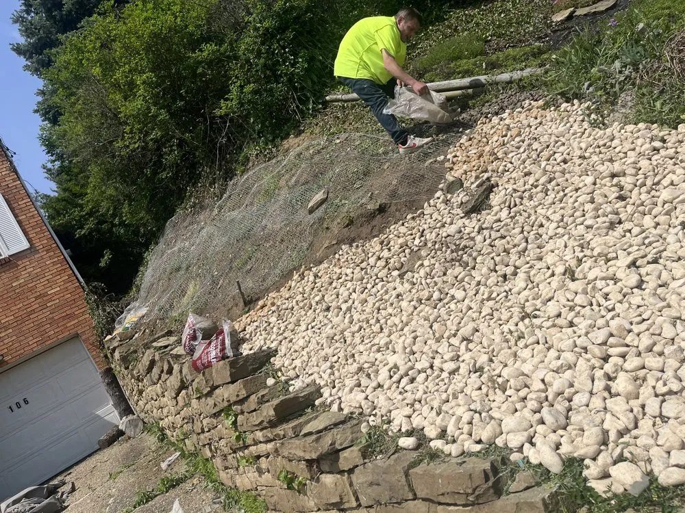 Professional lawn care service for homes in Pittsburgh, PA by Landscaping Solutions