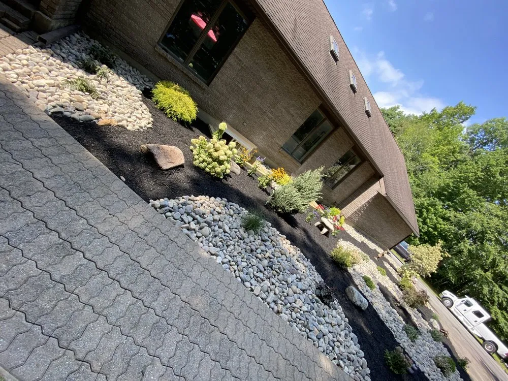 Expert lawn care service experts serving Clifton Park, NY - Landscaping Spot Designs