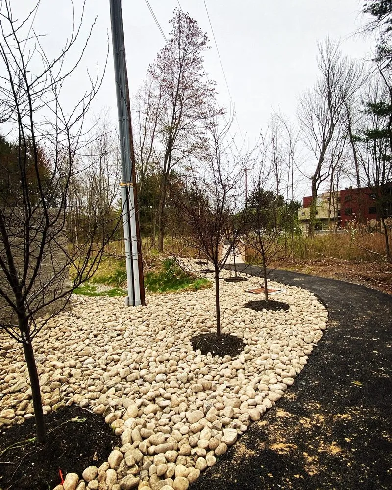 Trusted lawn mowing service with custom design across Clifton Park, NY - Landscaping Spot Designs