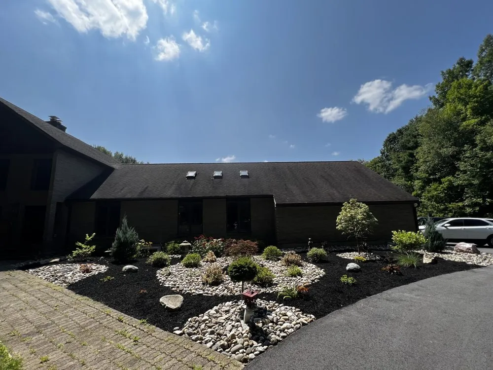 Affordable yard cleanup service for year-round maintenance in Clifton Park, NY by Landscaping Spot Designs