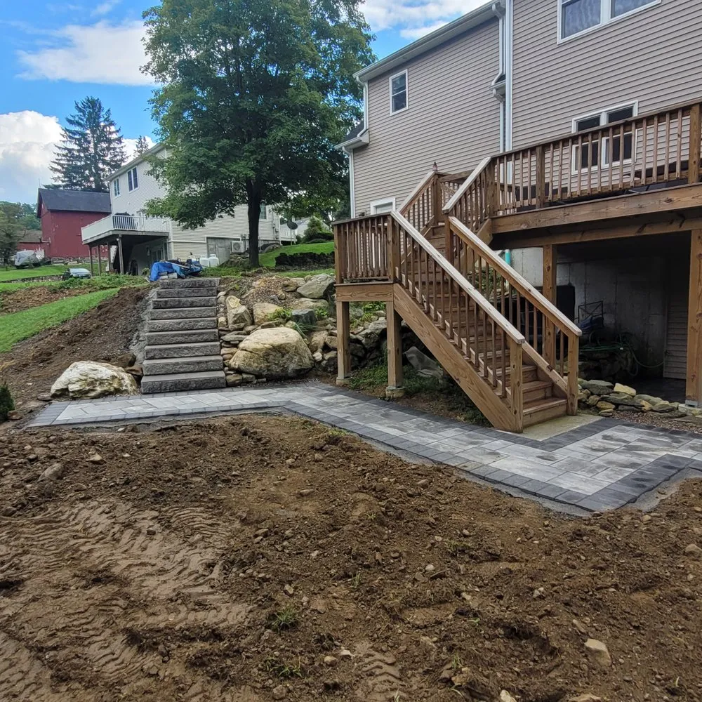 Local lawn mowing service for year-round maintenance in Newtown, CT by Landscaping Unlimited