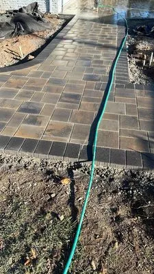 Landscaping,Pavers Concrete,Clean ups Logo