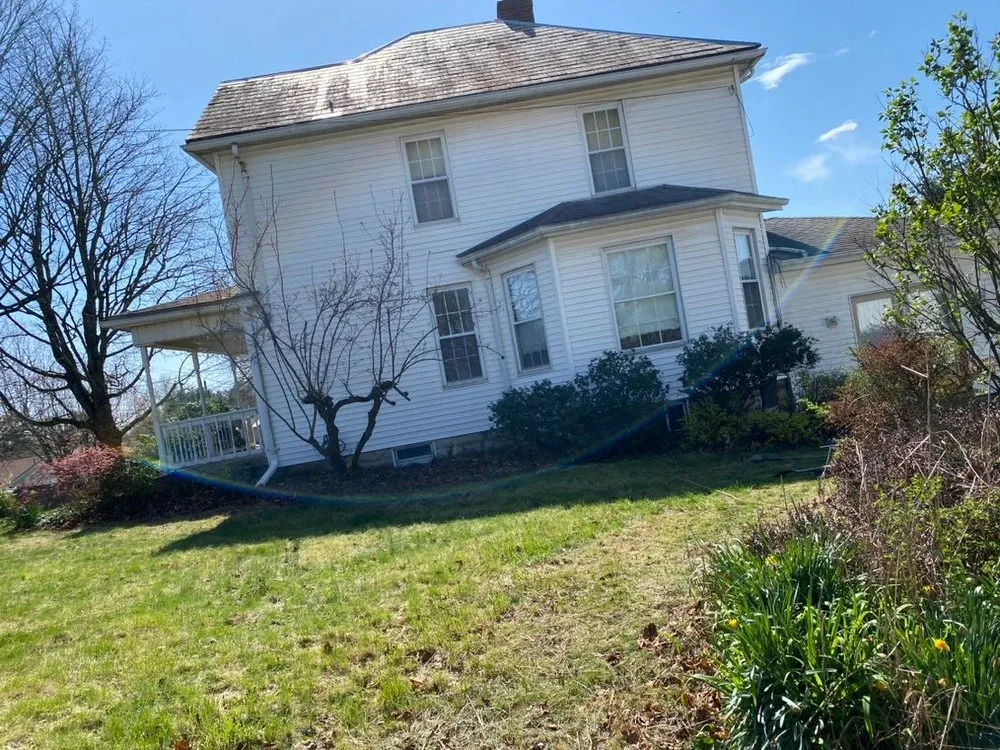 Custom outdoor landscaping for homes in Barnesville, OH by Landsharks