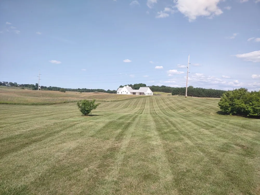 Affordable landscape design for year-round maintenance in Traverse City, MI by Landsharks Lawn and Landscaping