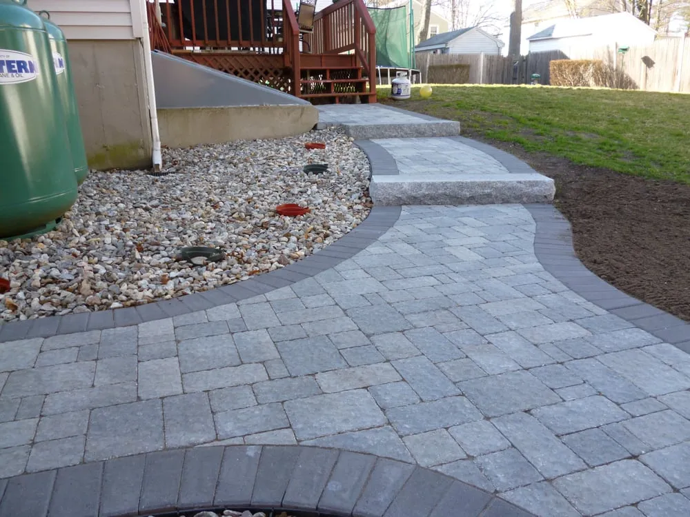 Expert lawn mowing service for homes in Wilmington, MA by Langone Bros Landscaping