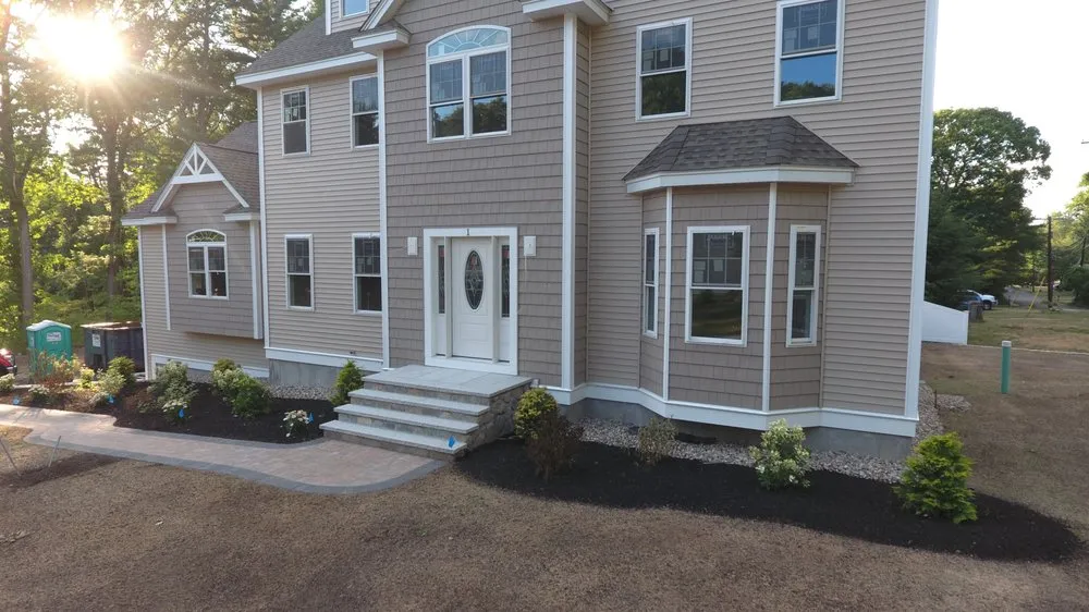 Affordable lawn mowing service for year-round maintenance in Wilmington, MA by Langone Bros Landscaping