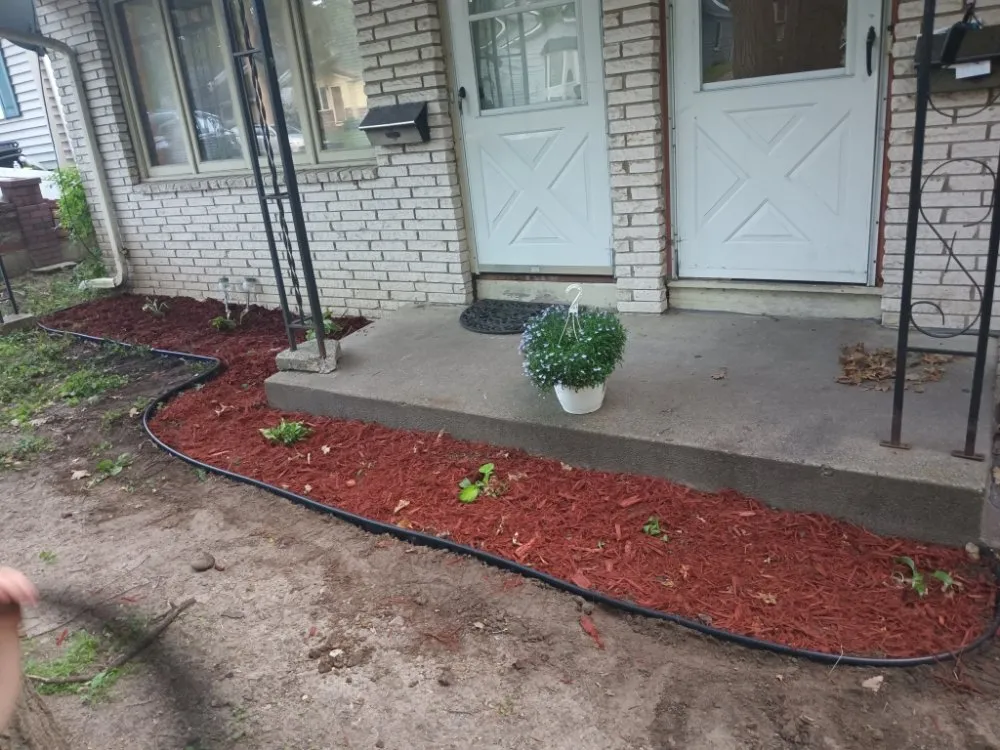 Affordable yard maintenance for beautiful yards in Minneapolis, MN by Larkin Lawn Care