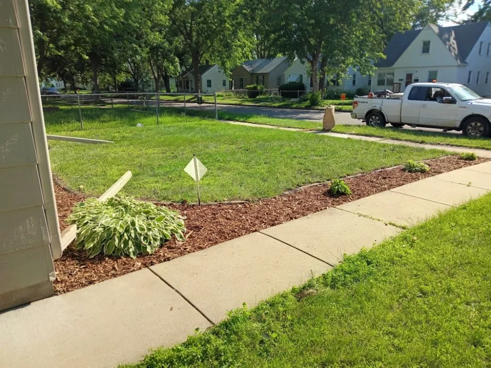Top-rated landscape installation for year-round maintenance in Minneapolis, MN by Larkin Lawn Care