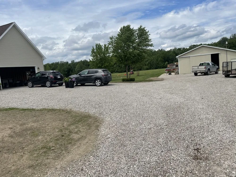 Custom outdoor landscaping with custom design across Milan, MI - LaRoy AG & Construction