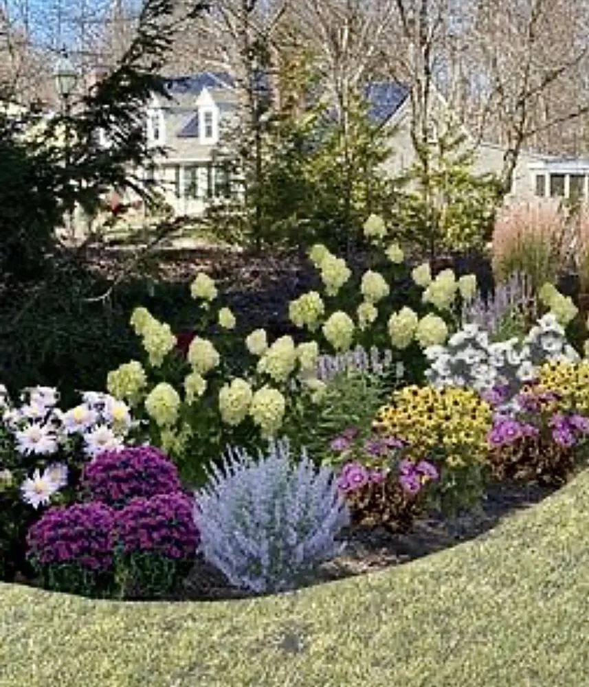 Professional lawn mowing service for year-round maintenance across Bourne, MA - Larrys Landscape