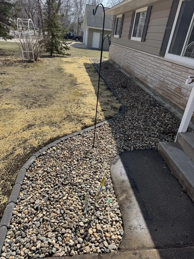 Professional garden landscaping for year-round maintenance in Litchfield, MN by Larson Outdoor Solutions