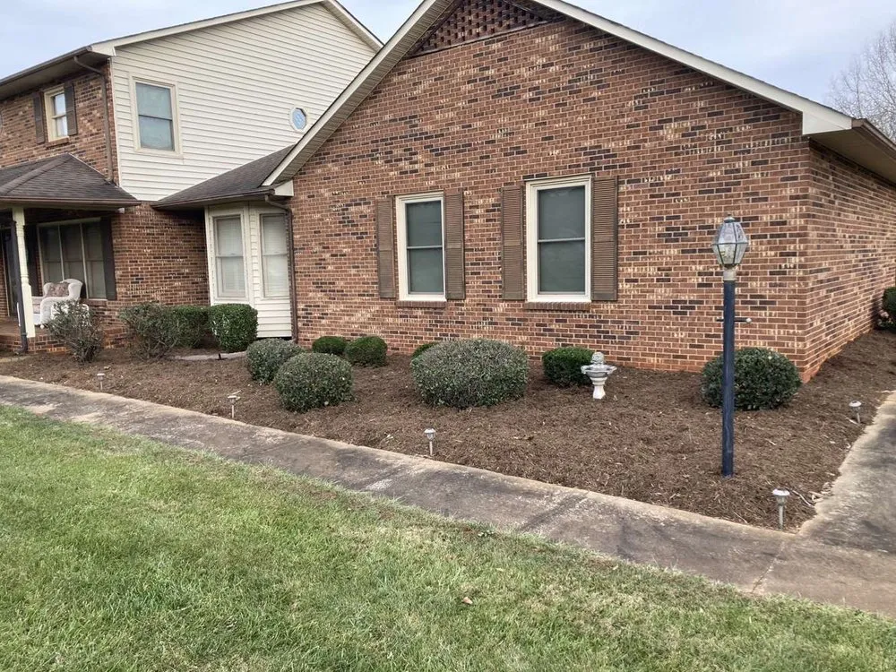 Custom landscape design with custom design across Lincolnton, NC - Larsons Lawn Care and Junk Removal