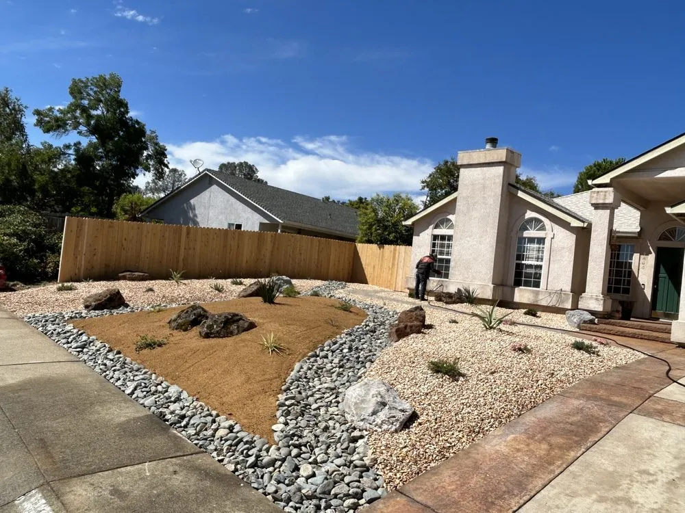 Expert lawn mowing service for homes in Anderson, CA by Lassen Design Scape