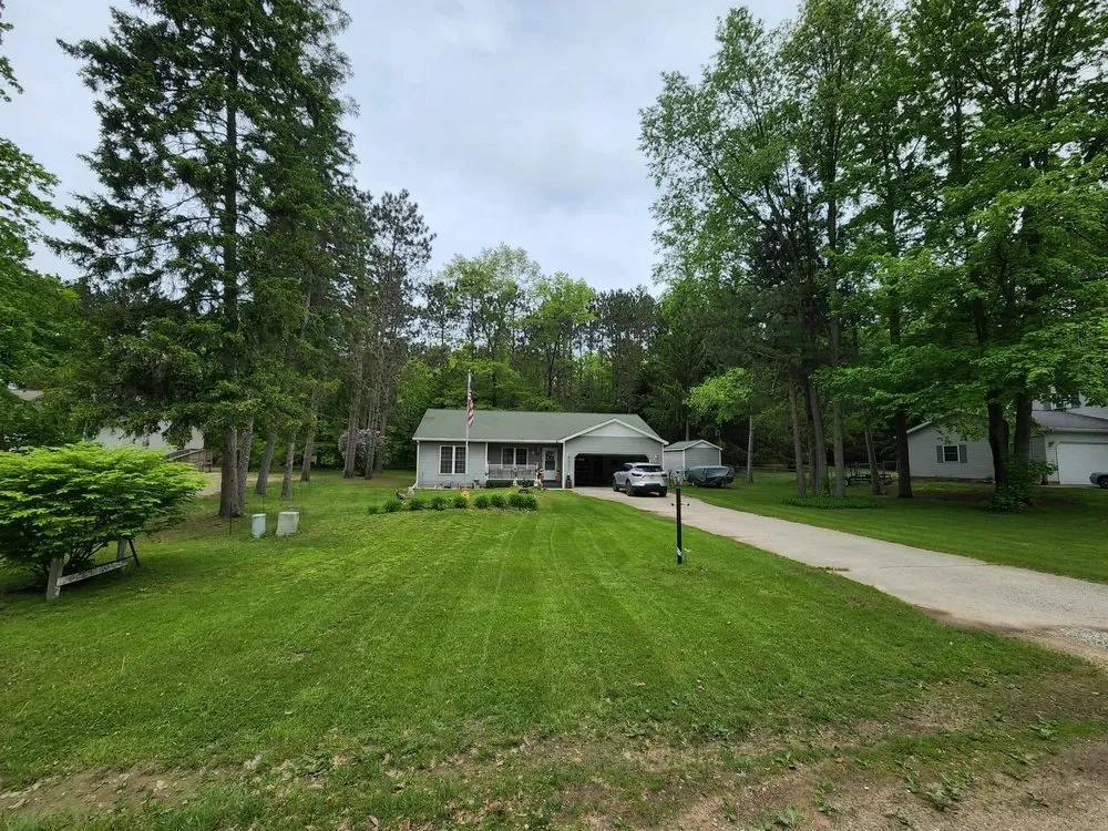 Custom yard maintenance for residential properties across Farwell, MI - Lassen Lawn Care