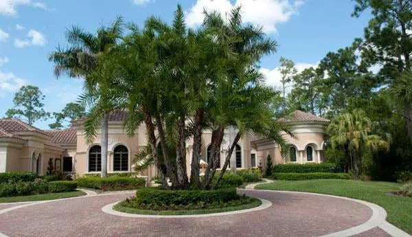Custom residential landscaping with custom design in Naples, FL by Latitude 26 Lawn and Garden