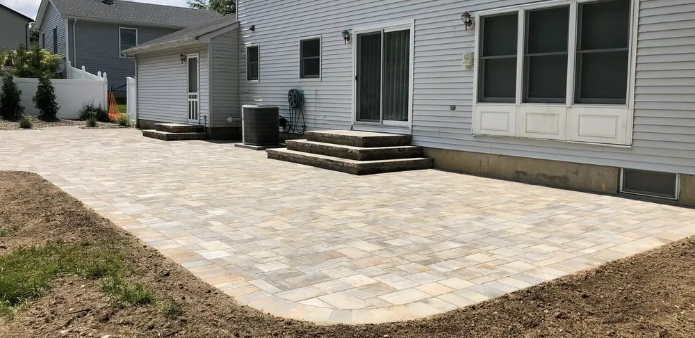 Custom outdoor landscaping for residential properties in Manalapan, NJ by Lauro Landscaping