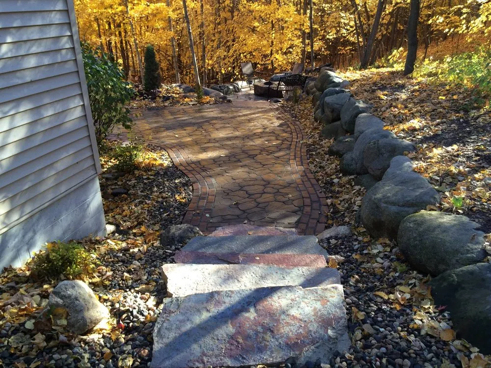 Reliable yard cleanup service for year-round maintenance in Minneapolis, MN by Lavish Lawn and Landscape