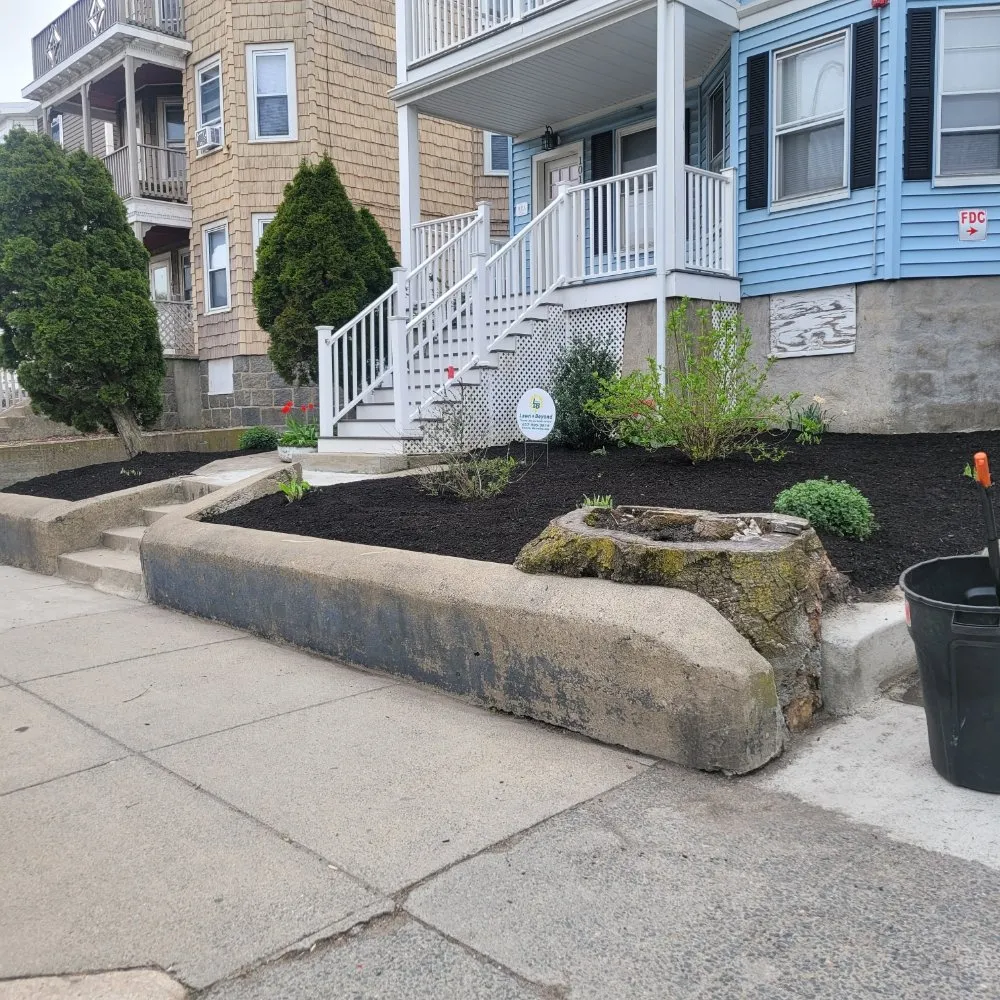 Expert yard maintenance for residential properties across Boston, MA - Lawn & Beyond Organic Landscaping