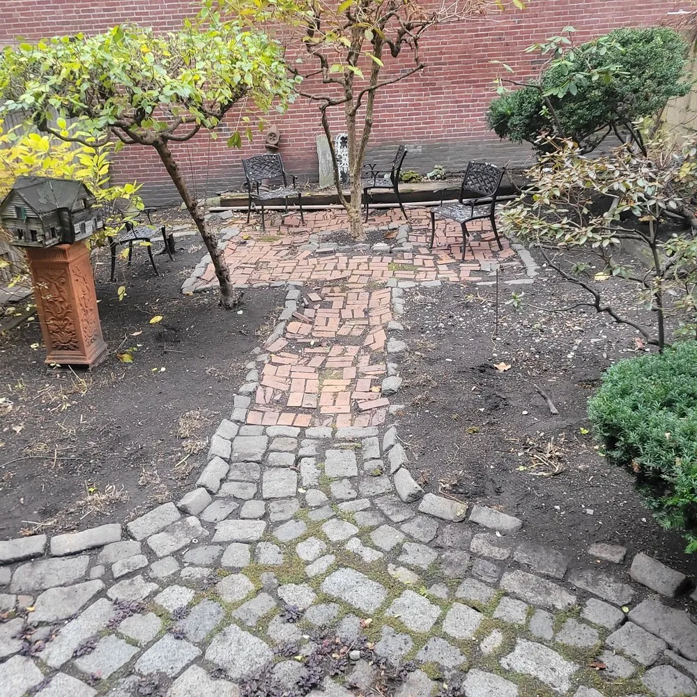 Expert yard maintenance for homes in Boston, MA by Lawn & Beyond Organic Landscaping
