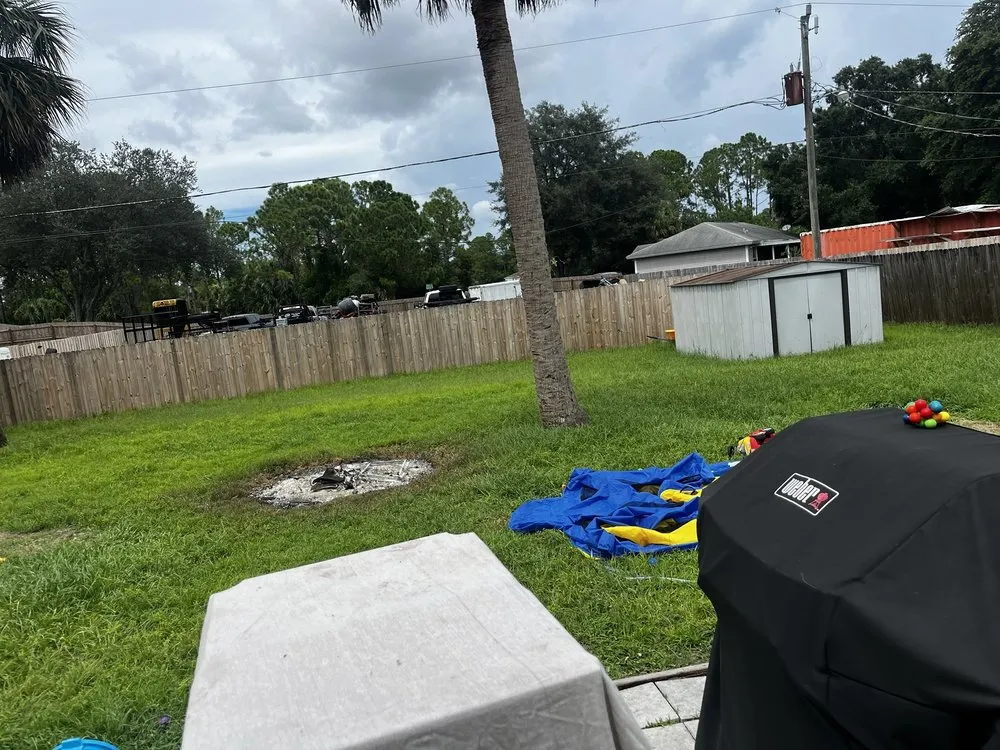 Affordable yard maintenance for homes in Palm Bay, FL by Lawn & Order Premium Lawnscape Services
